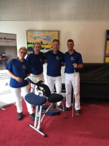 Vier medewerkers van de Stoelmassage